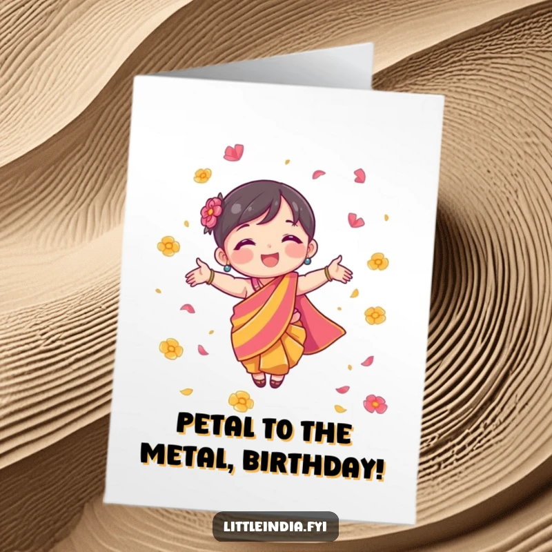 Funny free printable birthday card of a character in a colourful sari joyfully scattering flower petals for celebration.