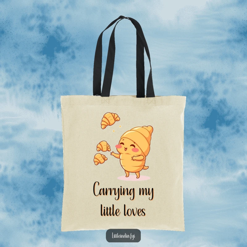 Funny blushing croissant character juggling small croissants on a durable tote bag, ideal for grocery runs or daily errands.